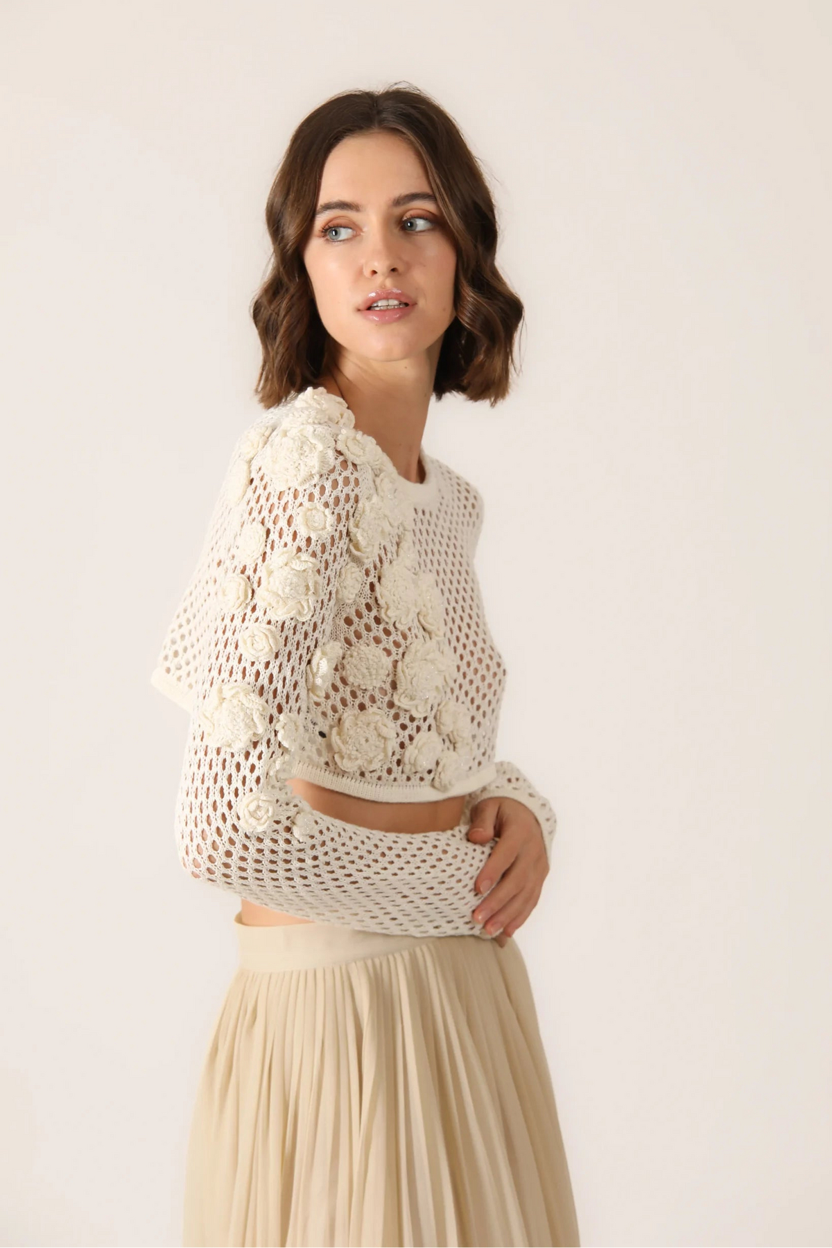 Mesh crop with crochet flowers. This product is produced on a personal order.