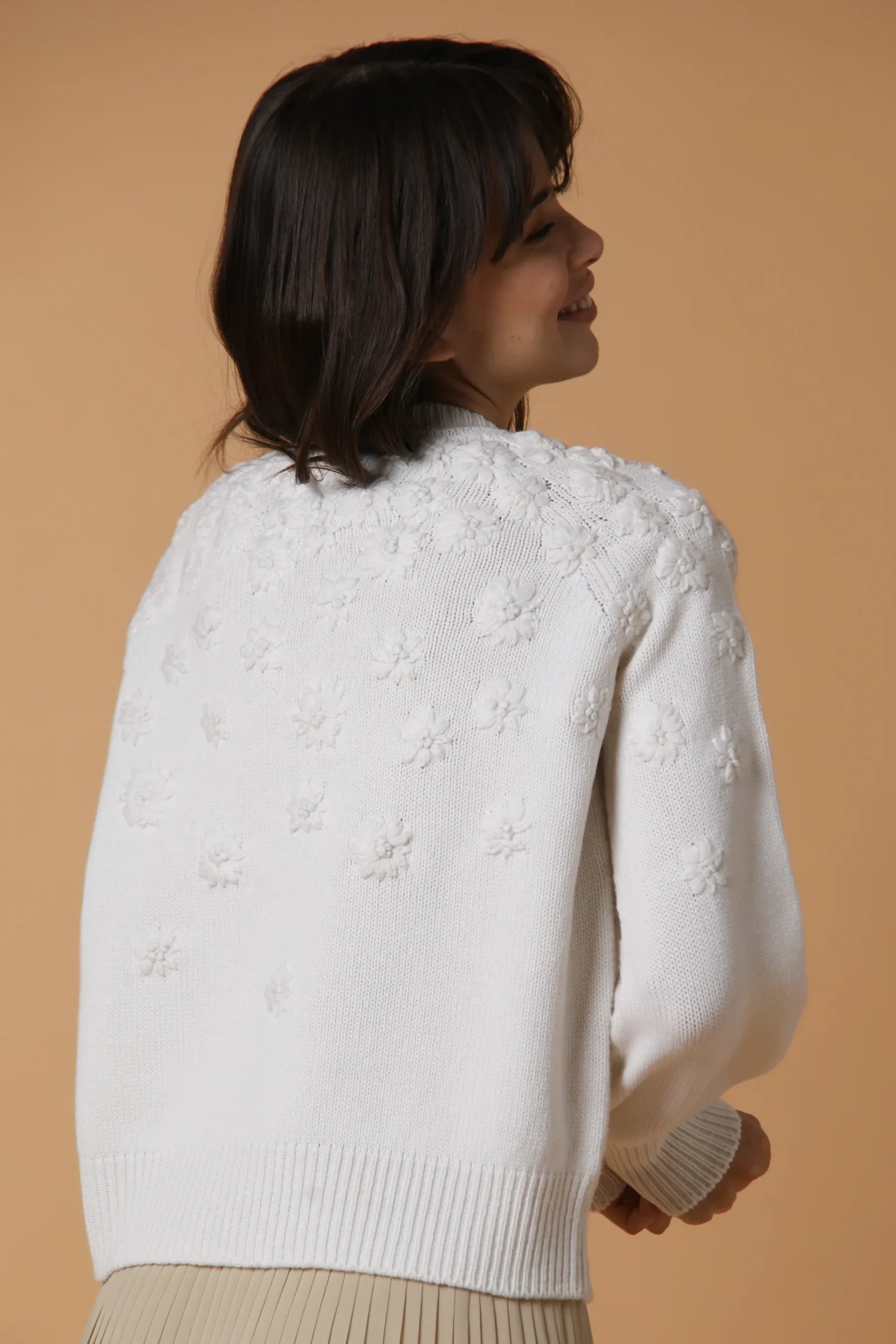 Sweater with hand embroidered flowers