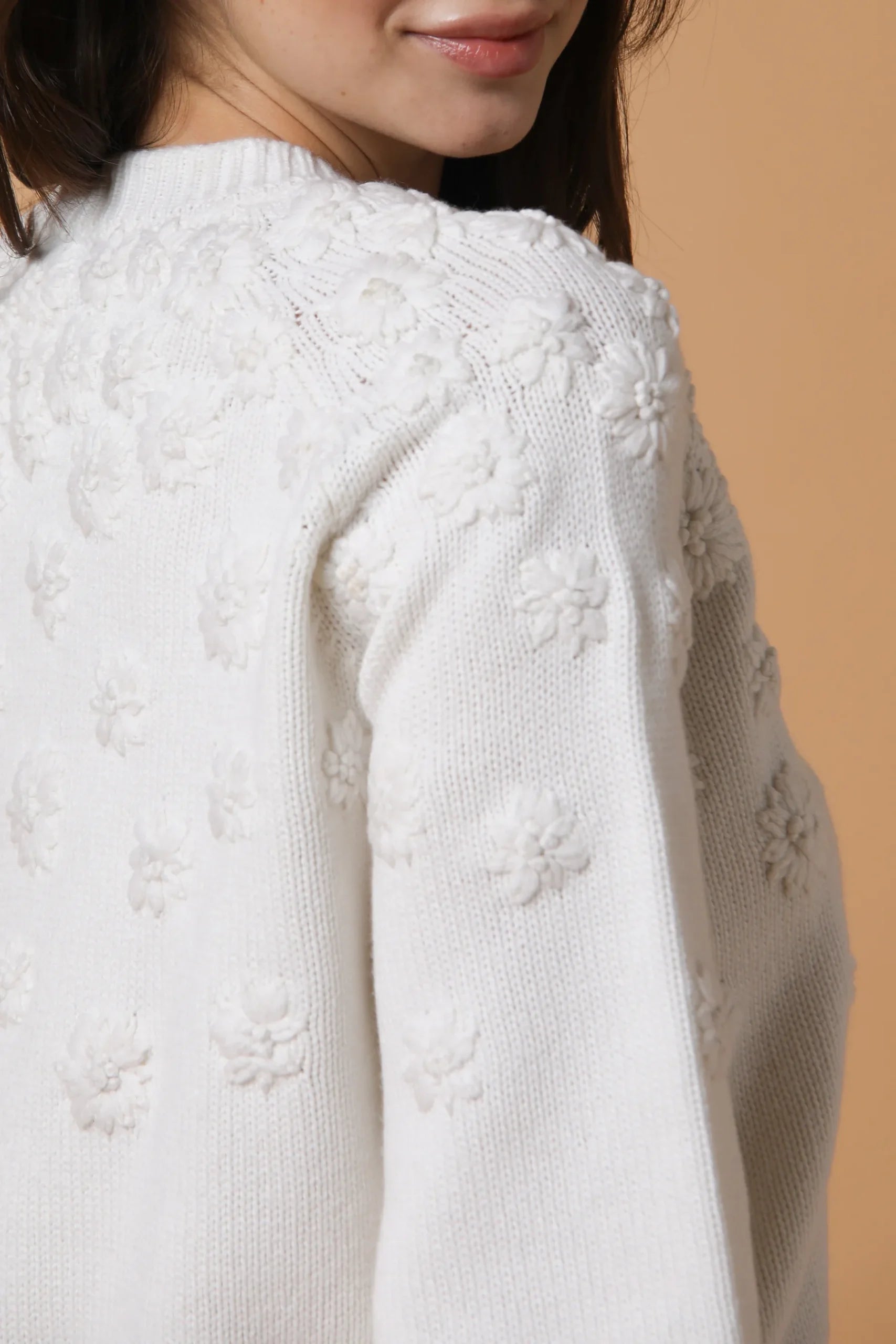 Sweater with hand embroidered flowers