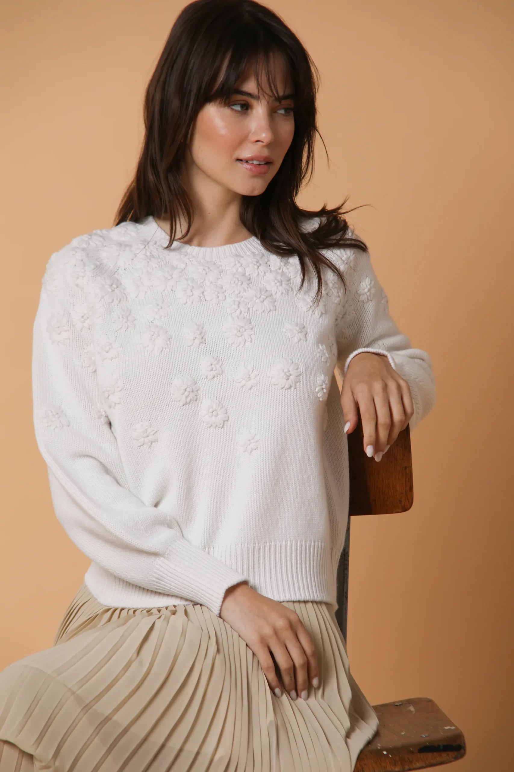 Sweater with hand embroidered flowers