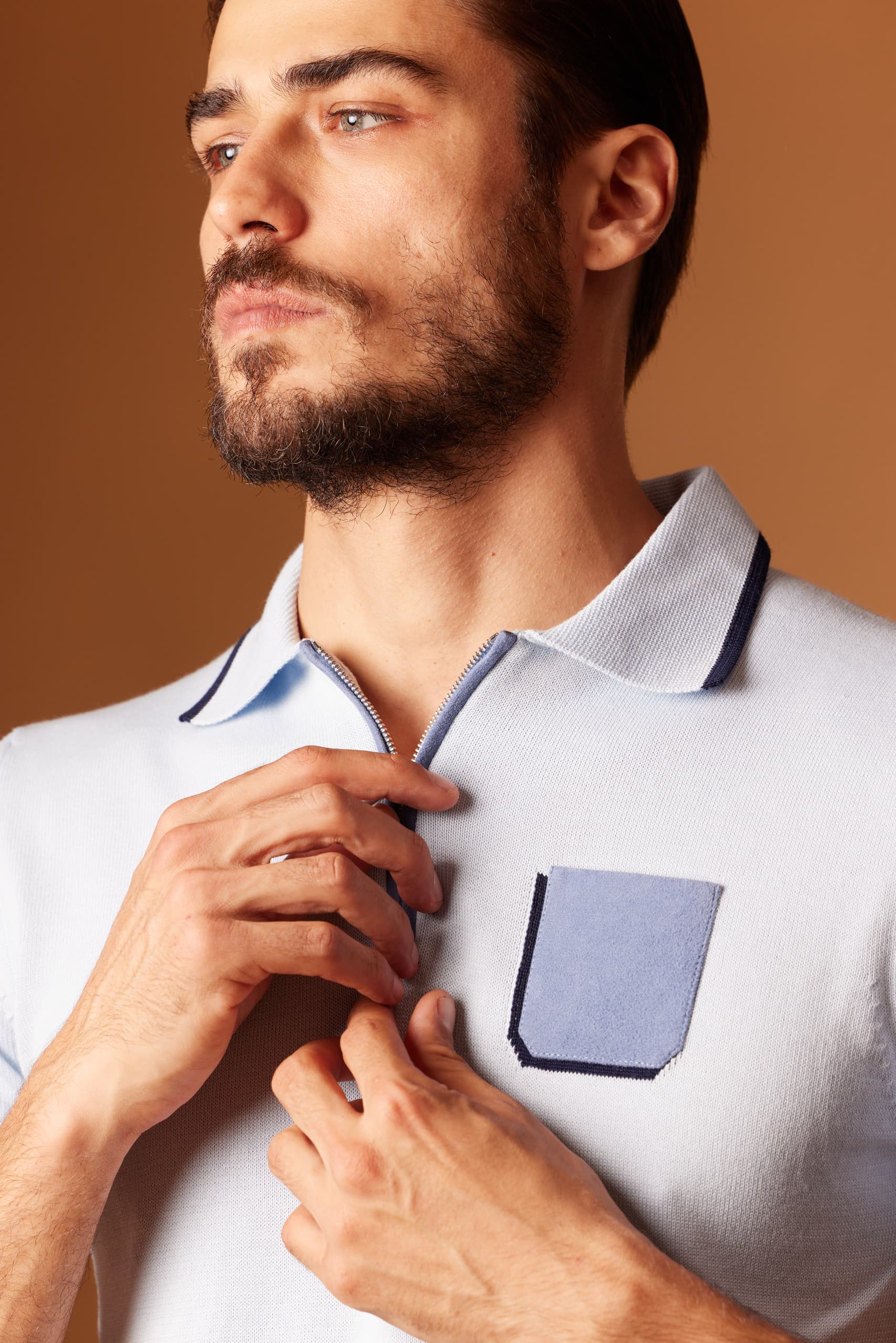 Polo zippé avec poche