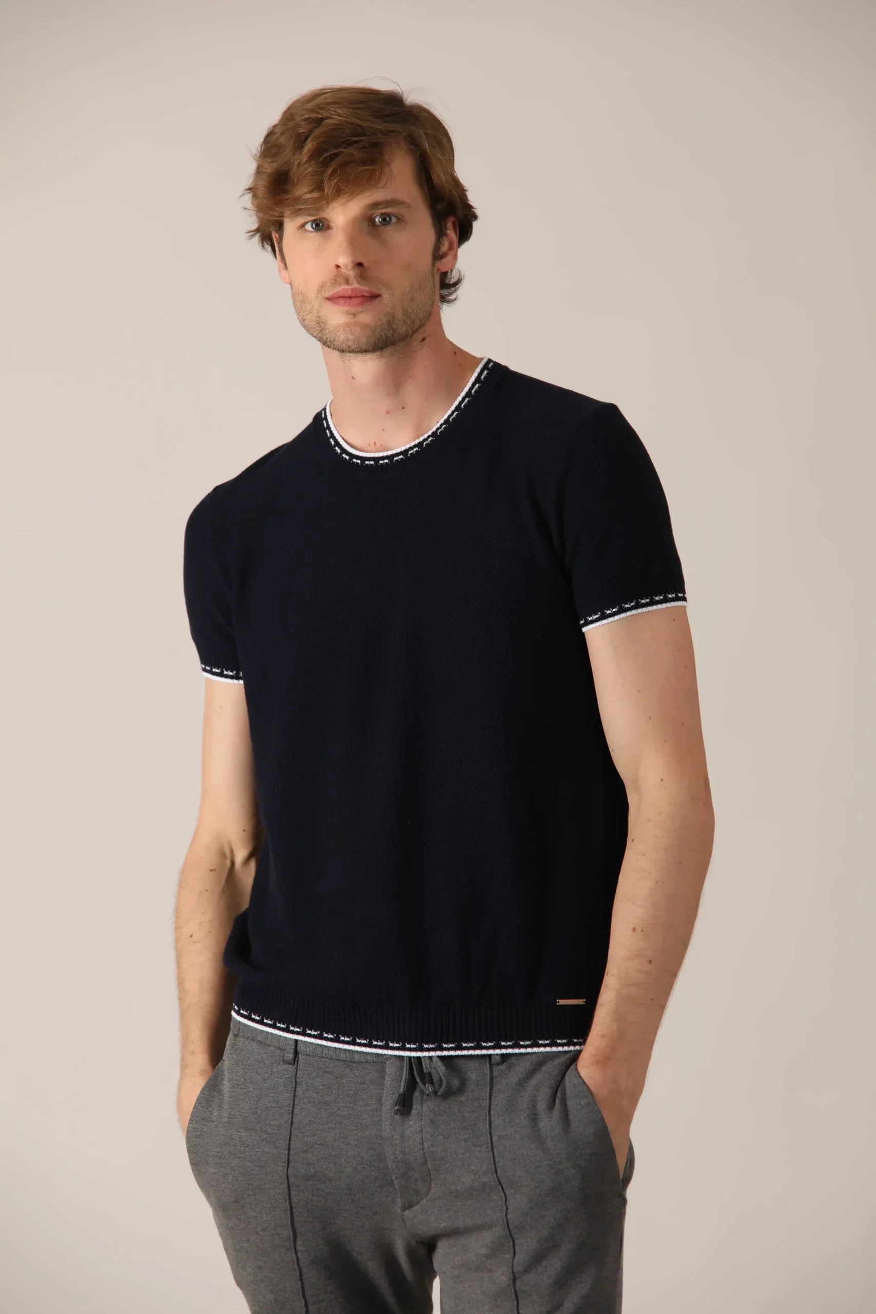 Cotton t-shirt, contemporary design with small details of contrasting hatches.