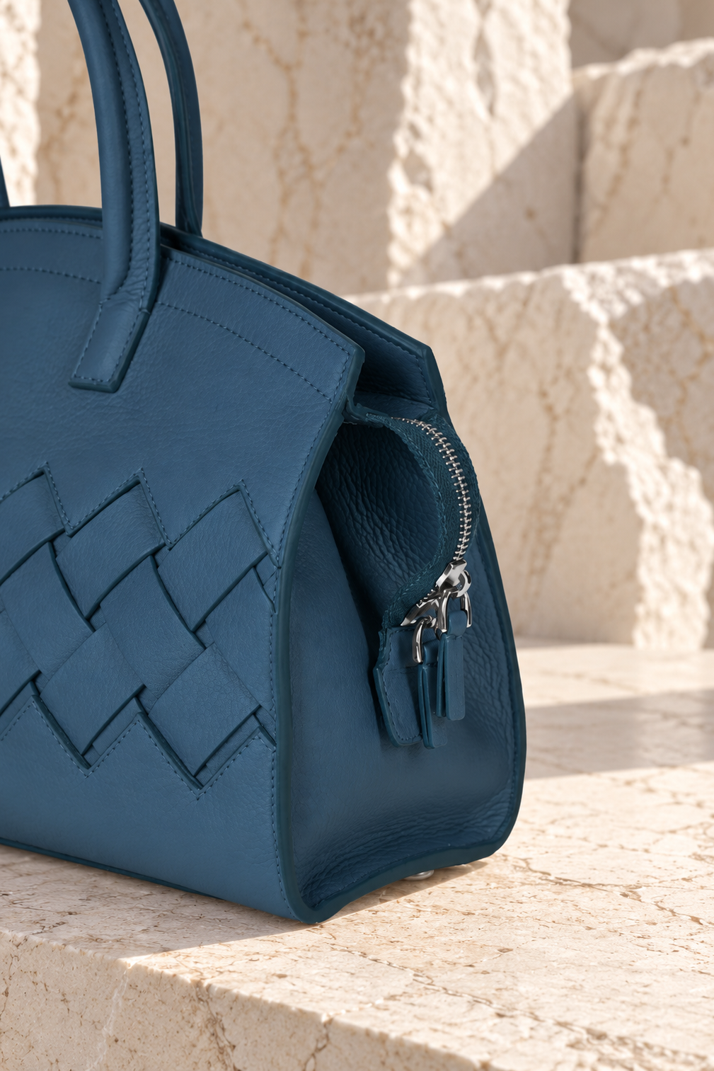 Borsa in pelle intrecciata