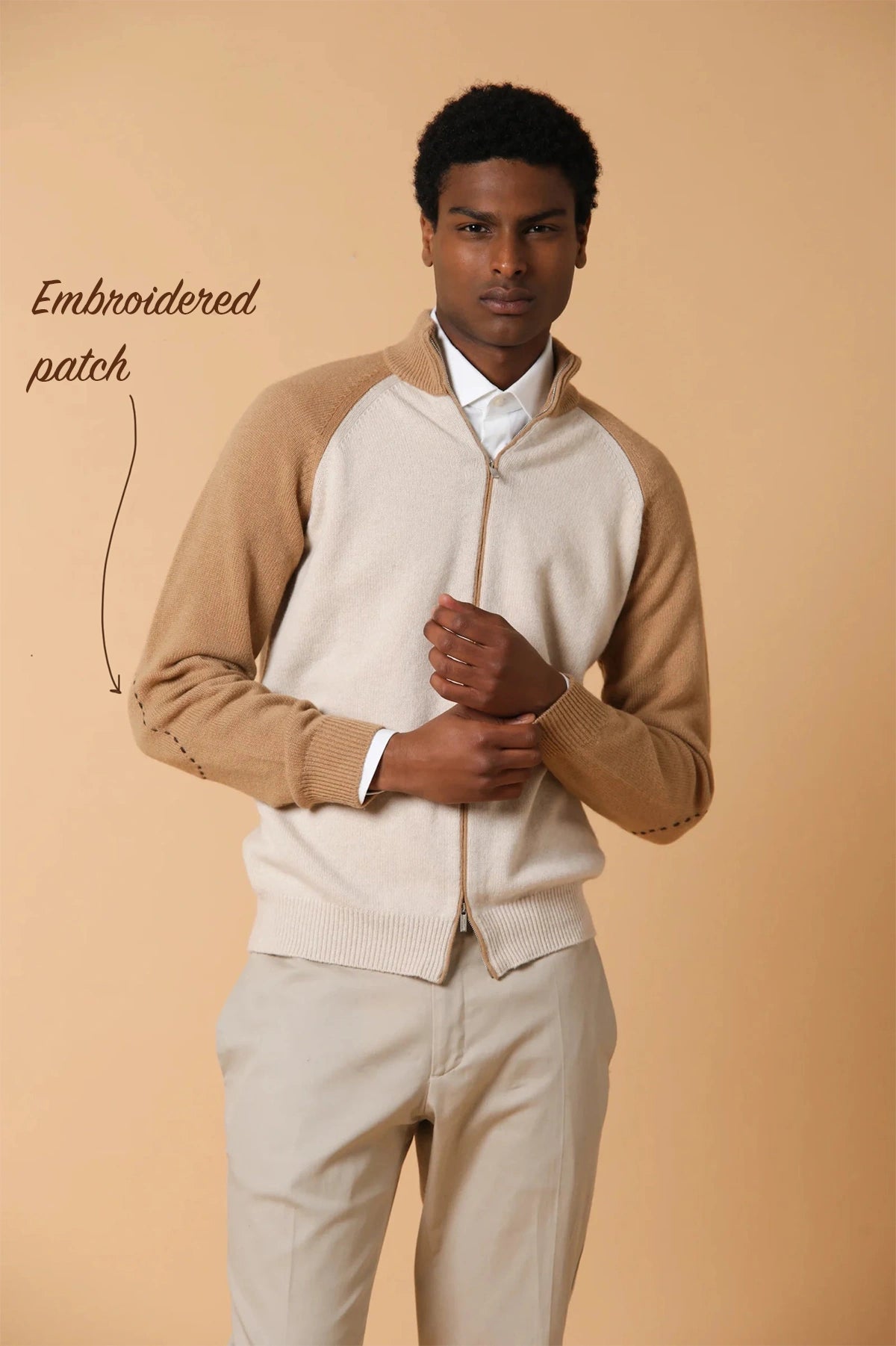Bomber jacket with stitched patches